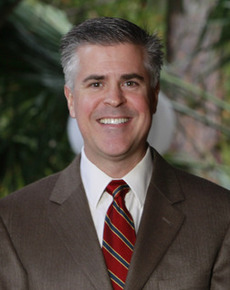 Dr. John W Tyrone