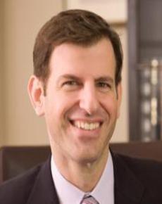 Dr. Adam R Kolker